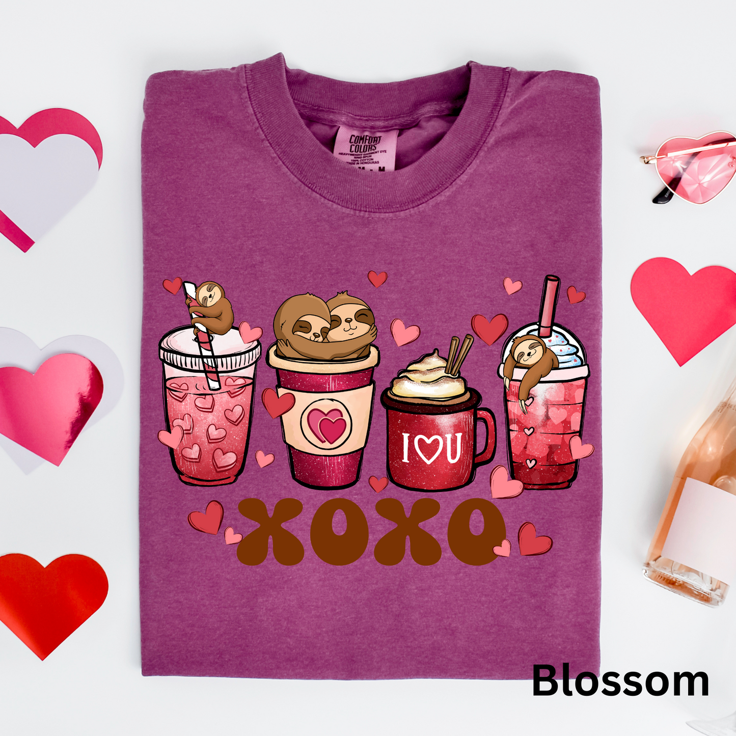 a t - shirt with a picture of a slotty bear and two cups of