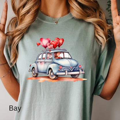 a woman wearing a t - shirt with a vw bug on it