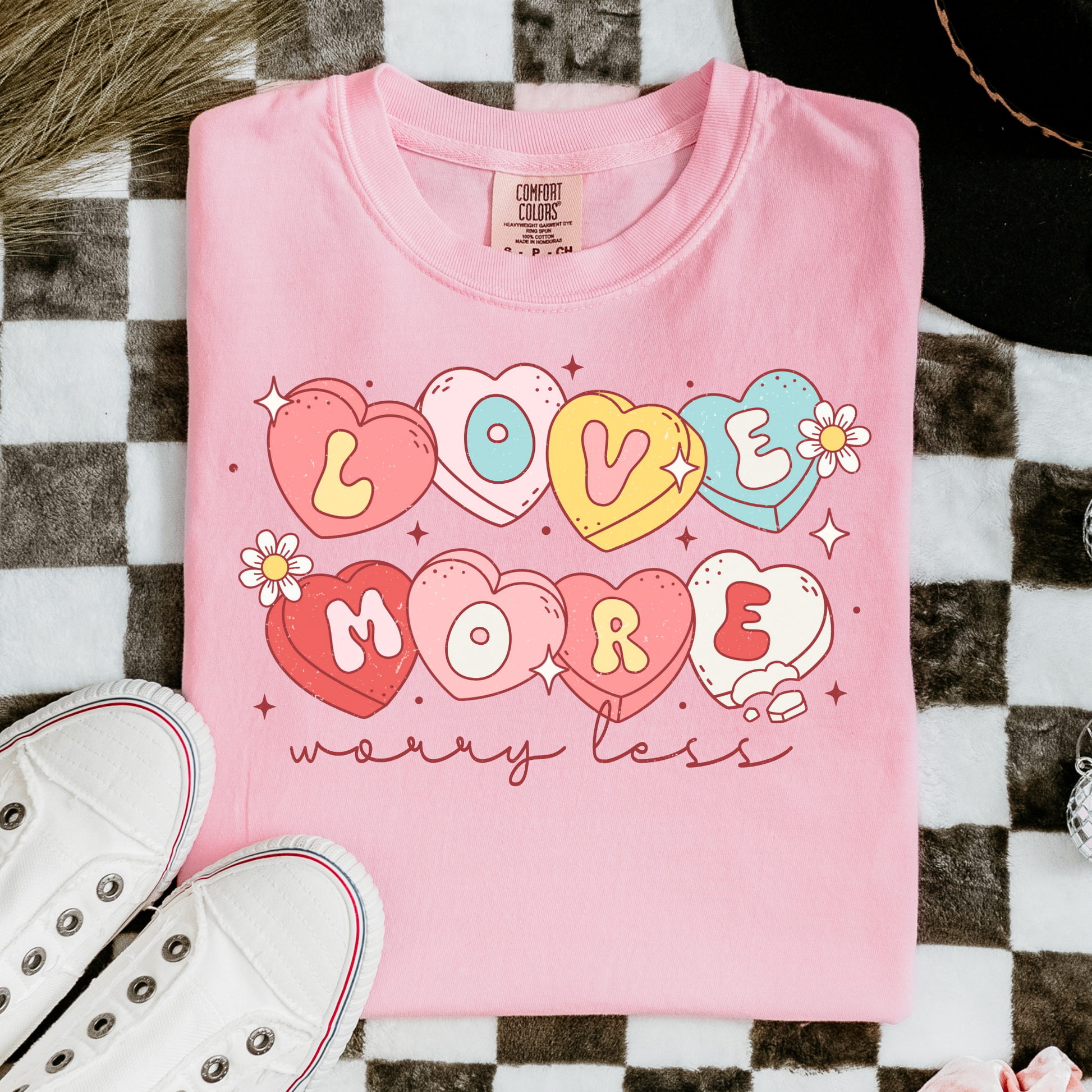 a pink shirt that says love is for mom