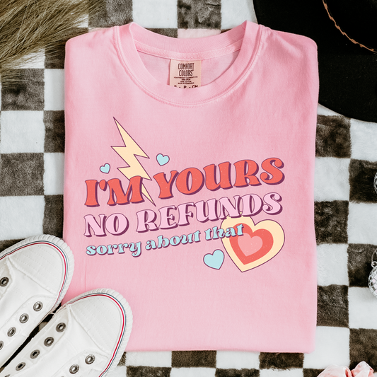 a pink t - shirt that says i'm yours no returns sorry about that