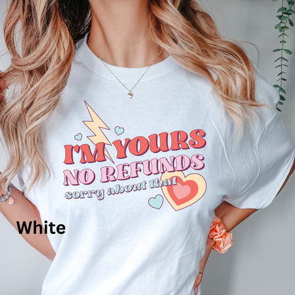 a woman wearing a t - shirt that says i'm yours no refund