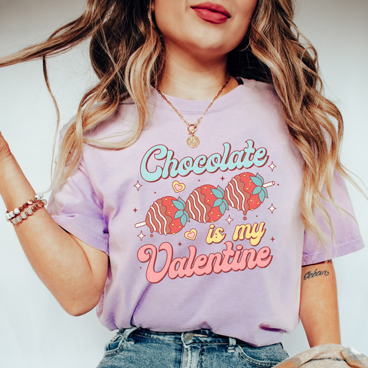 a woman wearing a shirt that says chocolate is my valentine