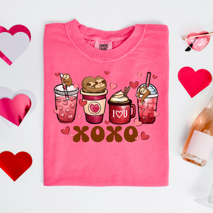 a pink t - shirt with a picture of a couple of drinks on it